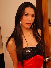 Sexy ladyboy in red satin dress